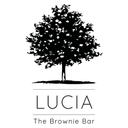 Lucia The Brownie Bar logo